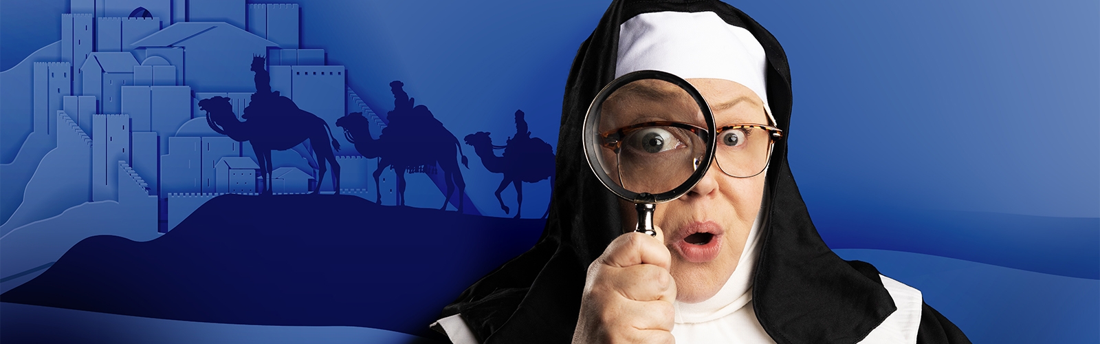 A nun holds a magnifying glass up to her eye in front of a graphic of the three magi approaching Bethlehem.